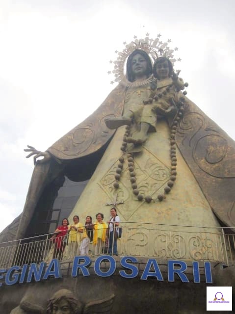 Pilgrims Up at the Foot of the Blessed Mother